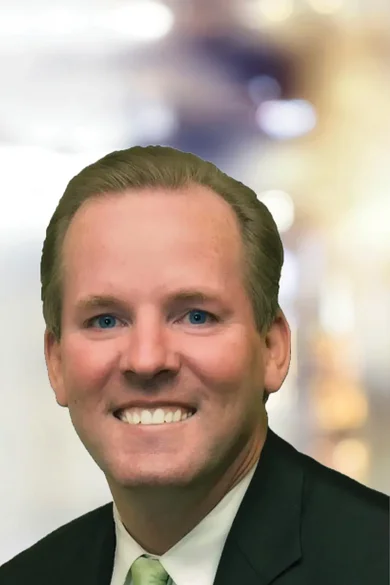 Portrait of Tom Greeves, REALTOR®, ABR®.